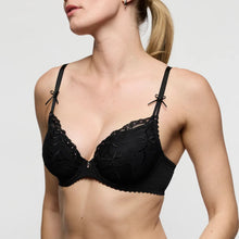 Load image into Gallery viewer, Black lace bra worn by a model on a plain background
