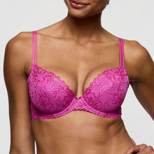 Load image into Gallery viewer, Pink lace bra worn by a model on a plain background