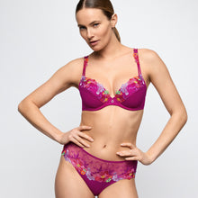 Load image into Gallery viewer, Woman wearing a colorful bikini set on a white background