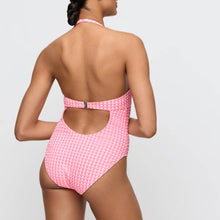 Load image into Gallery viewer, Pink one-piece swimsuit with cutout design on a white background