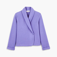 Load image into Gallery viewer, Azure. Soft fleece wrapover long sleeved bedjacket. It closes with a single Corozo button. The shawl collar and curved front detail add the final touches of style to this soft, light and cosy bedjacket. Made in Portugal. Available in Azur Blue Composition: 70% Polyester, 30% Viscose. Machine Washable.
