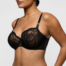 Load image into Gallery viewer, Black lace bra worn by a model on a light gray background