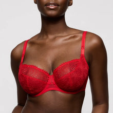 Load image into Gallery viewer, Red lace bra worn by a model on a light gray background