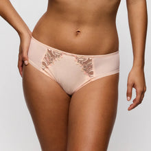 Load image into Gallery viewer, Beige lace underwear worn by a person on a plain background