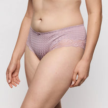 Load image into Gallery viewer, Person wearing a pair of pink lace underwear on a plain background