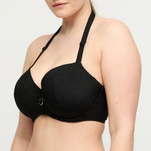 Load image into Gallery viewer, Black bikini top worn by a person on a white background