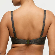 Load image into Gallery viewer, Person wearing a black bra with green straps on a plain background