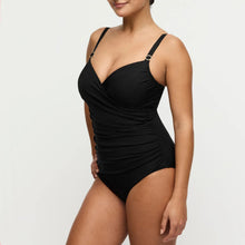 Load image into Gallery viewer, Black swimsuit worn by a model on a white background