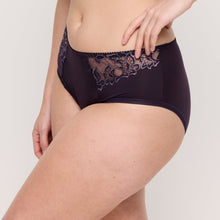 Load image into Gallery viewer, Person wearing dark purple lace-trimmed underwear on a light background