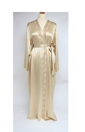 Beautiful full length dressing gown in pure silk satin in a collarless kimono style. It has 2 side pockets and belted at the waist. The appliqué lace runs the entire length of the wrapover section of the robe. This is a classic style, with clean simple lines but with an added touch of luxury with its lace detailing.  Fabric Content: 100% Pure Silk Made in Italy Machine washable.