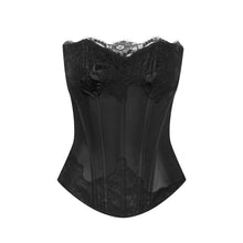 Load image into Gallery viewer, This is a beautiful, traditional corset made the French way. It has a leather appearance, giving a wetlook sheen. Its clever boning draws in the waist and supports the bust. It also has a beautiful lace detail at the bust and hip line. The back has a centred zip. This is a stunning garment, perfect for day or evening wear.
Made in France.