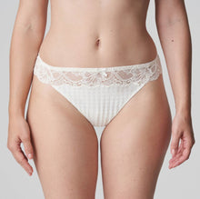Load image into Gallery viewer, This G/String leaves the bottom uncovered and makes the leg appear longer. Sexy yet discreet, with a super lacy look. Non bulky under clothing. Fabric content: Polyamide: 73%, Elastane:19%, Cotton: 8%. Ivory.