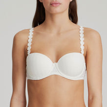 Load image into Gallery viewer, Smooth formed cup underwire balconnet bra with daisy strap detail. This underwire bra may be converted to a halter strap. This bra has the added advantage that it may be used as a halter or crossed over at the back. Fabric Content: Polyester: 53%, Polyamide: 39%, Elastane: 8%