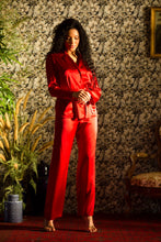 Load image into Gallery viewer, Marjolaine are the classic 'men's style' pyjamas, but with some elegant extra features. They are made from 100% pure heavy weight silk. They have a revere collar with beautiful stitching detail. An elasticated waist with a flat front panel for extra smoothness when sleeping. The trouser legs are stylishly wide for extra comfort and movement. Two front pockets on the jacket and a belt at the waist finish off these easy, chic and altogether fabulous ladies pyjamas.