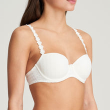 Load image into Gallery viewer, Smooth formed cup underwire balconnet bra with daisy strap detail. This underwire bra may be converted to a halter strap. This bra has the added advantage that it may be used as a halter or crossed over at the back. Fabric Content: Polyester: 53%, Polyamide: 39%, Elastane: 8%