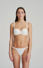 Load image into Gallery viewer, Smooth formed cup underwire balconnet bra with daisy strap detail. This underwire bra may be converted to a halter strap. This bra has the added advantage that it may be used as a halter or crossed over at the back. Fabric Content: Polyester: 53%, Polyamide: 39%, Elastane: 8%