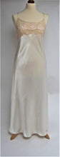 Load image into Gallery viewer, Beautiful full length pure silk satin nightgown. The bodice is composed of sheer contrasting ecru embroidered lace. Full length in a heavy silk satin, there is a slit to the side for ease when sleeping. The scooped to waist back with lace trim is stunning. The nightdress is cut on the bias for full movement. The rouleau straps give an extra finesse to this delightful nightgown.