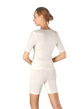 Load image into Gallery viewer, Beautiful Woolen Silk T/Shirt style Vest. This temperature regulating natural fabric is so comfortable to wear. It has no side seams and has a stylish satin edging for subtle elegance. Hanro Woolen/Silk sizing is on the larger end of the spectrum. When ordering select the size down from normal. Fabric mix: 70% merino wool, 30% pure silk Machine washable