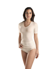 Load image into Gallery viewer, Beautiful Woolen Silk T/Shirt style Vest. This temperature regulating natural fabric is so comfortable to wear. It has no side seams and has a stylish satin edging for subtle elegance. Hanro Woolen/Silk sizing is on the larger end of the spectrum. When ordering select the size down from normal. Fabric mix: 70% merino wool, 30% pure silk Machine washable