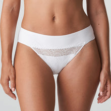 Load image into Gallery viewer, Pure White. Wide banded soft and comfortable tanga style G/String. Tonal embroidered lace on a tulle background. Laser cut back for smoothness under skirts, trousers and dresses. Fabric: Polyamide: 63%, Elastane: 24%, Cotton: 7%, Polyester: 6%