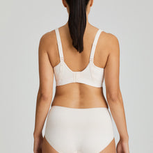 Load image into Gallery viewer, Fantastically supportive underwired Sports bra. It offers versatile support and extreme comfort. Adjustable straps, with hooks and eyes. With a graphic detail on the cups and straps, they have a cross-back or straight option. Three-part cup for extra support. Padded straps and closure. No irritation seamless cup. Anti-chafing super soft elastic banding.