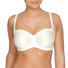 Load image into Gallery viewer, Ivory. Low-key but elegant seamless underwired bra with detachable shoulder straps and pre-formed cups offer a smooth all over finish. The light cups add no bulk while supporting and lifting the bust. This creates a gorgeous round shape that is so typical of Satin.
Fabric Content: Polyamide: 61%, Elastane: 23%, Polyester: 16%