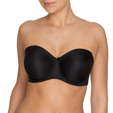 Load image into Gallery viewer, Black. Low-key but elegant seamless underwired bra with detachable shoulder straps and pre-formed cups offer a smooth all over finish. The light cups add no bulk while supporting and lifting the bust. This creates a gorgeous round shape that is so typical of Satin.
Fabric Content: Polyamide: 61%, Elastane: 23%, Polyester: 16%