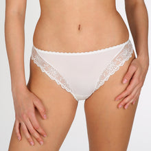 Load image into Gallery viewer, Italian brief with opaque front with lace side panels and all lace bottom. Ivory.Playful and sexy: two adjectives that pretty much capture the essence of this Italian style brief. The embroidery on the bottom is a piquant detail and delicious. There is full cover to the front but with an all lace back. The lace smooths over the bottom to give an invisible line. Fabric content: Polyamide: 46%, Polyester: 35%, Elastane: 12%, Cotton: 7%. Ivory.