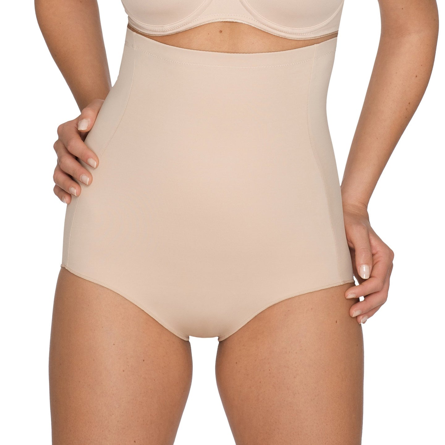 Caffé Latte. Elegant super figure-fixing panty girdle with a smart, smooth look. Worn just below the bra. It shapes tummy and waist to create a slim, flowing figure. The smooth finish over the stomach ensures it does not show under clothing. Its superior design guarantees that it does not roll down!  Fabric content: Polyamide: 59%, Elastane: 39%, Cotton: 2%