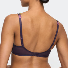 Load image into Gallery viewer, Navy blue bra with floral details on straps worn by a model against a neutral background
