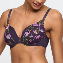 Load image into Gallery viewer, Woman wearing a floral-patterned bra on a plain background
