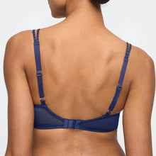 Load image into Gallery viewer, Blue bra worn by a model on a plain background
