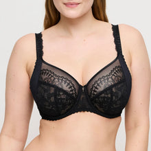 Load image into Gallery viewer, Black lace bra worn by a model on a plain background
