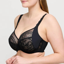 Load image into Gallery viewer, Black lace bra worn by a model on a plain background
