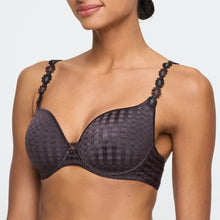 Load image into Gallery viewer, Black patterned bra worn by a model on a white background

