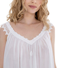 Load image into Gallery viewer, Very beautiful short (94cm) sleeveless short nightgown. Lace details on the V neck, straps and at the hem. Flared skirt for ease of movement when sleeping. Made in Germany from the finest pure Swiss cotton, Celestine nightdresses are diaphanous, offering perfect sleep without heaviness. Celestine nightwear, dressing gowns and short robes drop from the shoulder, therefore one size fits all.  Fabric composition:  100% Pure Swiss Cotton. 100% Guipure Cotton Lace. Machine Washable. White.
