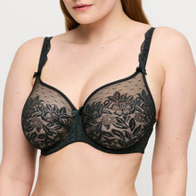 Load image into Gallery viewer, Green lace bra worn by a model on a plain background
