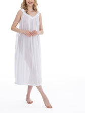 Load image into Gallery viewer, White Very beautiful long (123cm) sleeveless nightgown. Lace details on the gentle V neck &amp; wide straps. Flared skirt for ease of movement when sleeping. Made in Germany from  the finest pure Swiss cotton, Celestine nightdresses are diaphanous, offering perfect sleep without heaviness. Celestine nightwear, dressing gowns and short robes drop from the shoulder, therefore one size fits all.  Fabric composition:  100% Pure Swiss Cotton. 100% Guipure Cotton Lace. Machine Washable.
