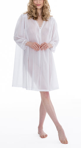 Very beautiful short (95cm) nightshirt style nightgown. Lace details on V neck and on the 3/4 length sleeve hem. Loose fitting skirt for ease of movement when sleeping. Made in Germany from the finest pure Swiss cotton, Celestine nightdresses are diaphanous, offering perfect sleep without heaviness. Celestine nightwear, dressing gowns and short robes drop from the shoulder, therefore one size fits all.  Fabric composition:  100% Pure Swiss Cotton. 100% Guipure Cotton Lace. Machine Washable.