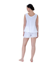 Load image into Gallery viewer, 100% Pre-washed Linen Shorty Pyjama set. The top has wide straps in a singlet style.  The gently rounded neckline is trimmed with cotton lace. The shorts are loose fitting and have an elasticated waist and have a wide lace trim on the hem. Made in Germany from the finest pure linen. Perfect for sleep without heaviness.  Celestine garments are also addictive, so watch out. Once tried, there is no turning back!   Composition: 100% Linen 100% Guipure Lace Machine Washable
