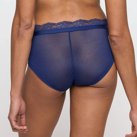Blue lace-trimmed underwear on a plain background
