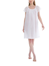 Load image into Gallery viewer, White Short (96cm) short sleeve nightgown. Lace detail on the gently rounded neckline with beautiful all lace short sleeve. Flared skirt for ease of movement when sleeping. Made in Germany from the finest pure Swiss cotton, Celestine nightdresses are diaphanous, offering perfect sleep without heaviness. Celestine nightwear, dressing gowns and short robes drop from the shoulder, therefore one size fits all.  Fabric composition:  100% Pure Swiss Cotton. 100% Guipure Cotton Lace. Machine Washable.
