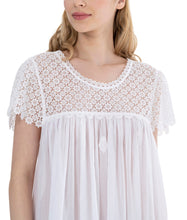 Load image into Gallery viewer, White Full Length (126cm) short sleeve nightgown. Heavy lace throughout the bodice. on the gently rounded neckline and short sleeve. Flared skirt for ease of movement when sleeping. Made in Germany from the finest pure Swiss cotton, Celestine nightdresses are diaphanous, offering perfect sleep without heaviness. Celestine nightwear, dressing gowns and short robes drop from the shoulder, therefore one size fits all.  Fabric composition:  100% Pure Swiss Cotton. 100% Guipure Cotton Lace. Machine Washable.
