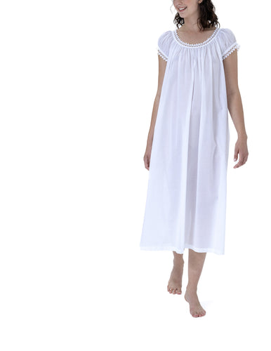 Very beautiful long (124cm) short sleeve nightgown. Lace detail on the gently rounded neckline and sleeve hem. Flared skirt for ease of movement when sleeping. Made in Germany from the finest pure Swiss cotton, Celestine nightdresses are diaphanous, offering perfect sleep without heaviness. Celestine nightwear, dressing gowns and short robes drop from the shoulder, therefore one size fits all. Fabric composition: 100% Pure Swiss Cotton. 100% Guipure Cotton Lace. Machine Washable.
