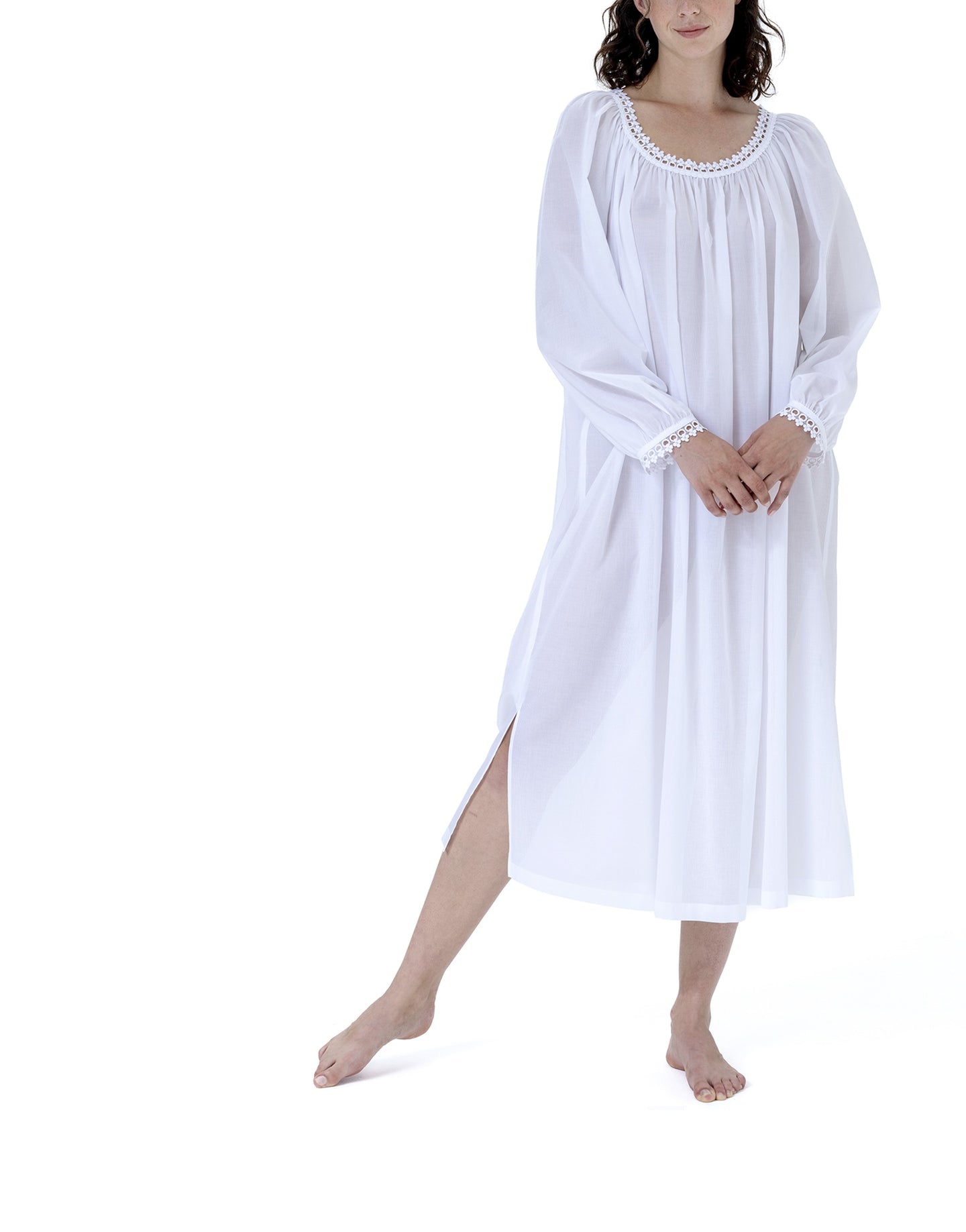Very beautiful long (124cm) long sleeve nightgown. Lace detail on the gently rounded neckline and the cuff hem. Flared skirt with a side slit for ease of movement when sleeping. Made in Germany from the finest pure Swiss cotton, Celestine nightdresses are diaphanous, offering perfect sleep without heaviness. Fabric composition: 100% Pure Swiss Cotton. 100% Guipure Cotton Lace. Machine Washable.