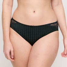 Load image into Gallery viewer, Green patterned underwear worn by a person on a plain background
