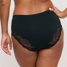 Load image into Gallery viewer, Green lace-trimmed underwear worn by a person on a plain background
