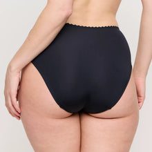 Load image into Gallery viewer, Person wearing black high-waisted underwear on a plain background
