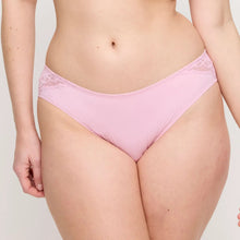 Load image into Gallery viewer, Person wearing a pink lace underwear set on a plain background
