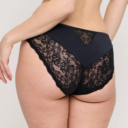 Black lace underwear on a plain background